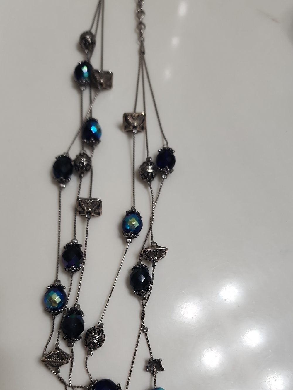 Layered Silver Necklace with Iridescent Blue Beads